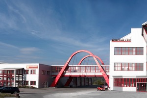  Company buildings with the mentioned red bridge 