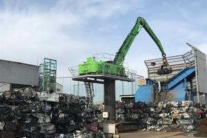  Material handler with crawler undercarriage instead of earthmoving excavator in  metal recycling 