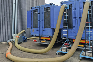  The shredded foam is directly transferred to a container waiting to be transported 